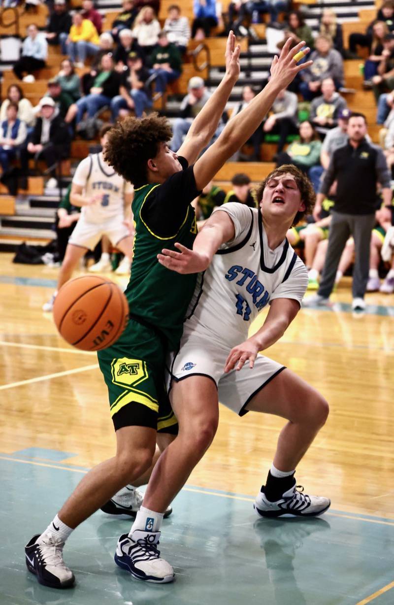 Bureau Valley's Blake Foster passes across the lane against Abingdon-Avon Friday night at the Storm Cellar. A-Town won 47-45.