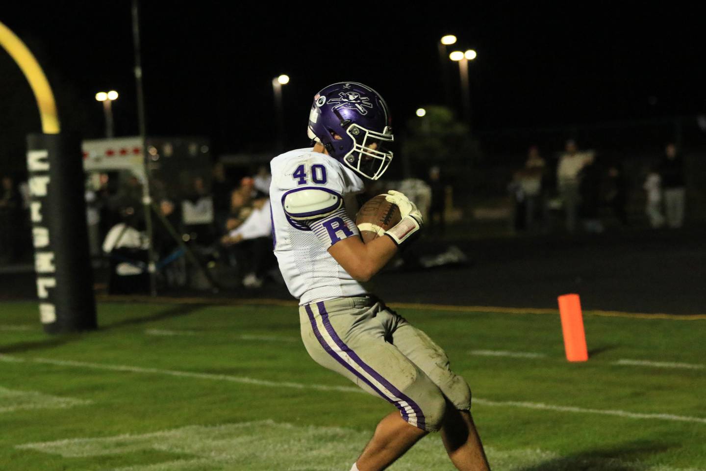 Rochelle's Roman Villalobos takes in a touchdown during the Hubs' game with Kaneland on Friday, Oct. 10, 2025.
