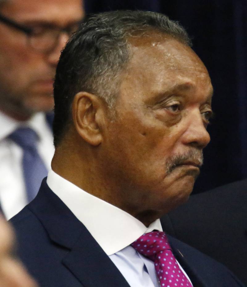 The Rev. Jesse Jackson listens as President Joe Biden promotes his "Build Back Better" campaign at McHenry County College on Wednesday, July 7, 2021 in Crystal Lake.