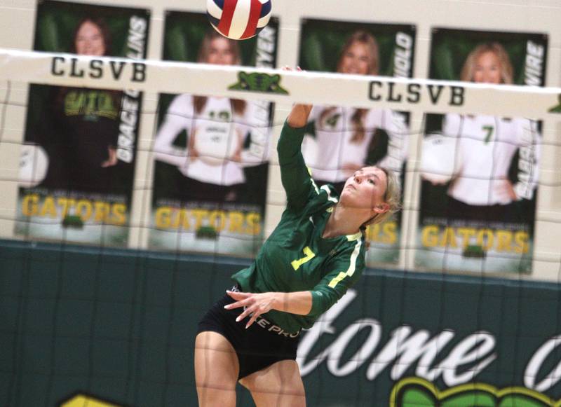Crystal Lake South’s Gabby Wire sends the ball against Prairie Ridge in varsity volleyball at Crystal Lake South Tuesday night.