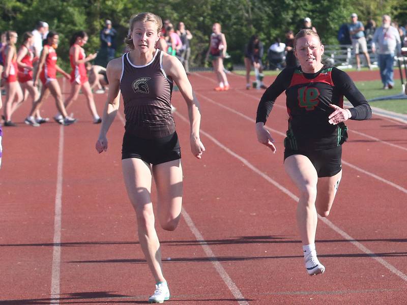Girls track and field: Late surge leads Sycamore to I-8 Conference title