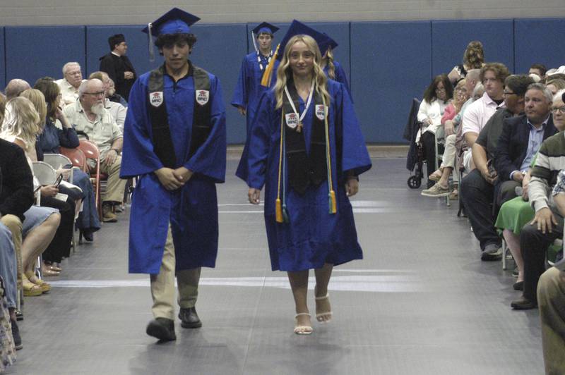 Newman graduates make their way to their seats.   The Newman High School Class of 2026 Commencement Ceremony was held on Wednesday, May 20, 2026, at Newman Central Catholic High School. in Sterling.