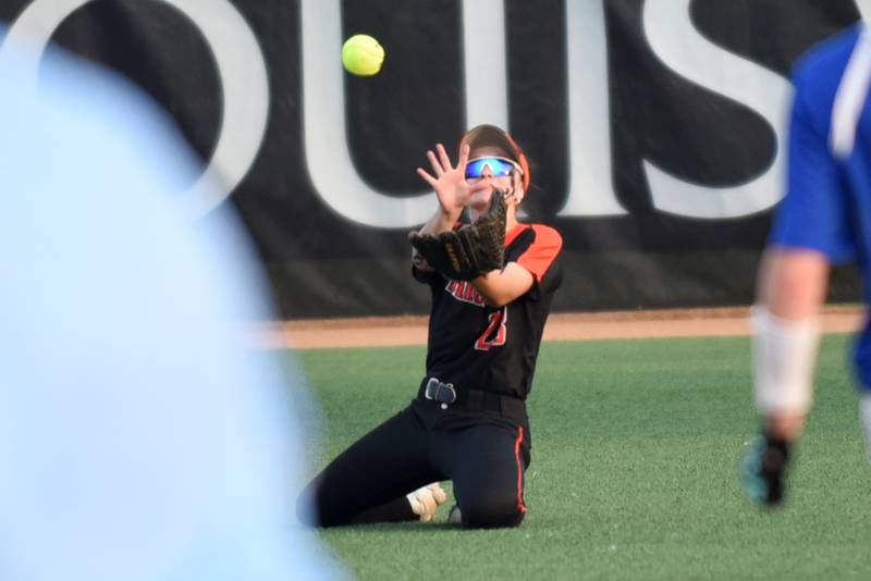 Beecher's Tayiah Scanlan makes a sliding catch to record the final out of the Bobcats' 4-2 win over Auburn in the Class 2A State semifinals at the Louisville Slugger Complex in Peoria Friday, June 6, 2025.