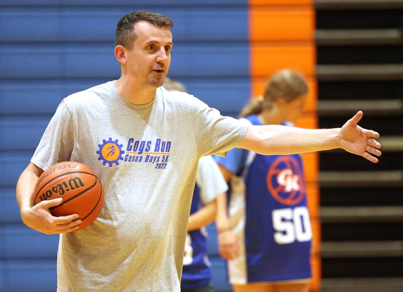 New Genoa-Kingston girls basketball coach Doug Brewington gives his team some instruction Wednesday, June 26, 2024, during summer practice at the school. Brewington was the head girls basketball coach at Hinckley-Big Rock last year.