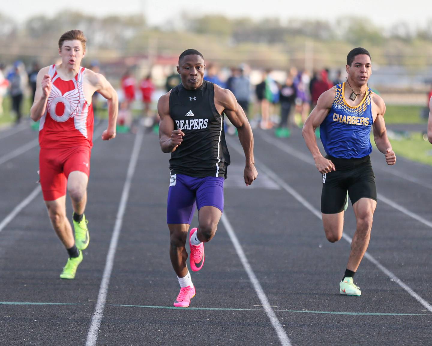 Plano's Waleed Johnson wins the 100 meters at the Field of Dreams Plano Invitational.  April 21, 2023.