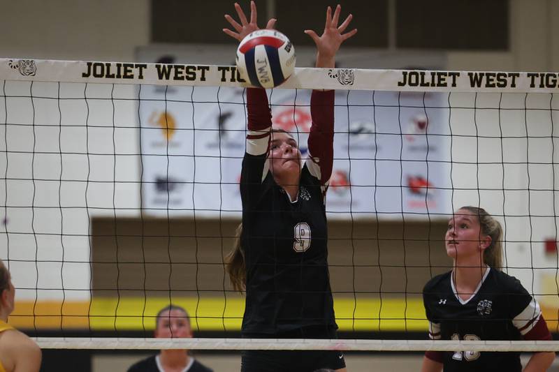 Plainfield North’s Isabelle Davis blocks a shot for a point against Joliet West on Wednesday, Sept. 6, 2023 in Joliet.