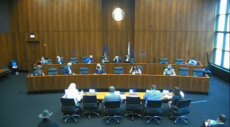 The Joint Committee on Administrative Rules questions officials from the Illinois State Board of Education about its mask mandate policies during a meeting Tuesday in Chicago