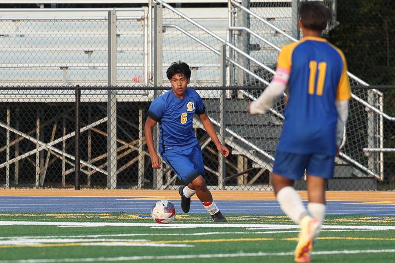 Joliet Central’s Christopher Felix looks for a play against Joliet Catholic on Monday, Sept. 9, 2024 in Joliet.