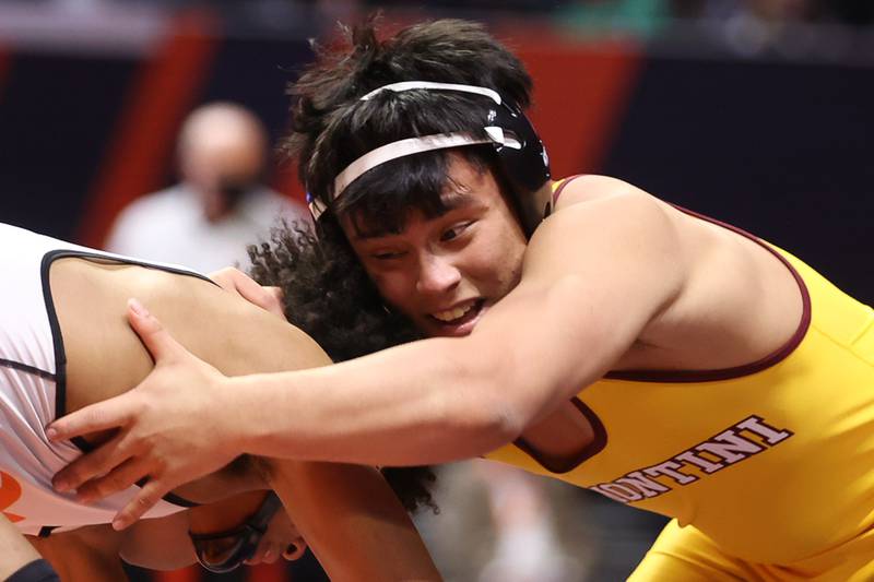 Montini’s David Mayora works against Freeport’s Tarrone Jackson in the Class 2A 152lb. 3rd place match at State Farm Center in Champaign. Saturday, Feb. 19, 2022, in Champaign.