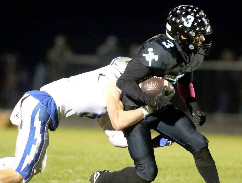 Woodstock North’s Braeden Berner runs the ball against Woodstock in varsity football at Woodstock North High School on Friday, October 24, 2025.