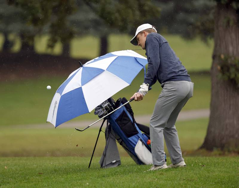 James Gaither, Wheaton North, chips to the green during the DuKane Conference Boys Varsity Tournament Tuesday, Sept. 24, 2024 Bartlett Hills Golf Club.