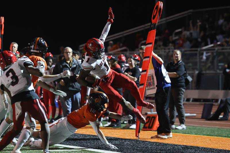 Bolingbrook’s Kyan Berry-Johnson flies out of bounds after a catch and run against Lincoln-Way West on Friday, Sept. 22 in New Lenox.