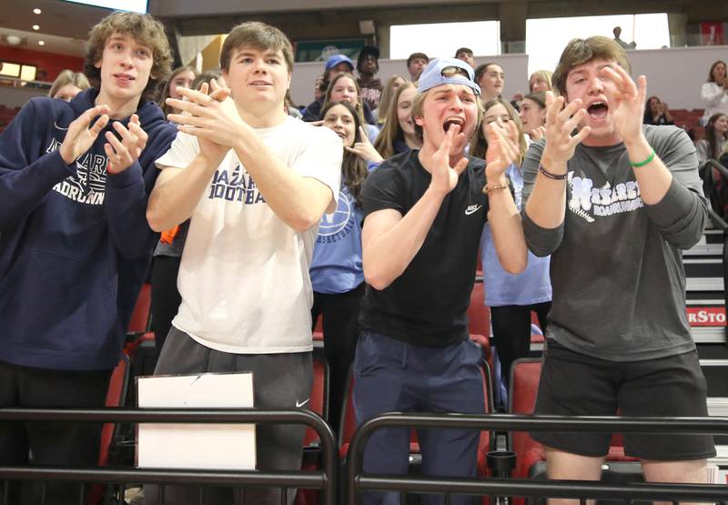 Nazareth fans celebrate as time ticks down in their win over Morton in the Class 3A state semifinal game Friday, March 4, 2022, in Redbird Arena at Illinois State University in Normal.