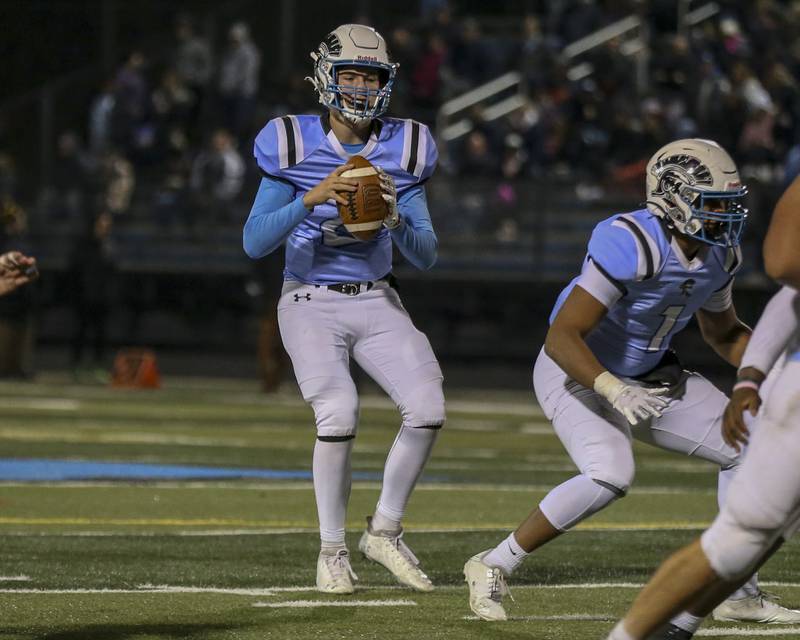 Willowbrook's Arthur Palicki (2) drops back to pass during Class 7A second-round game between Moline at Willowbrook.  Nov 5, 2021.