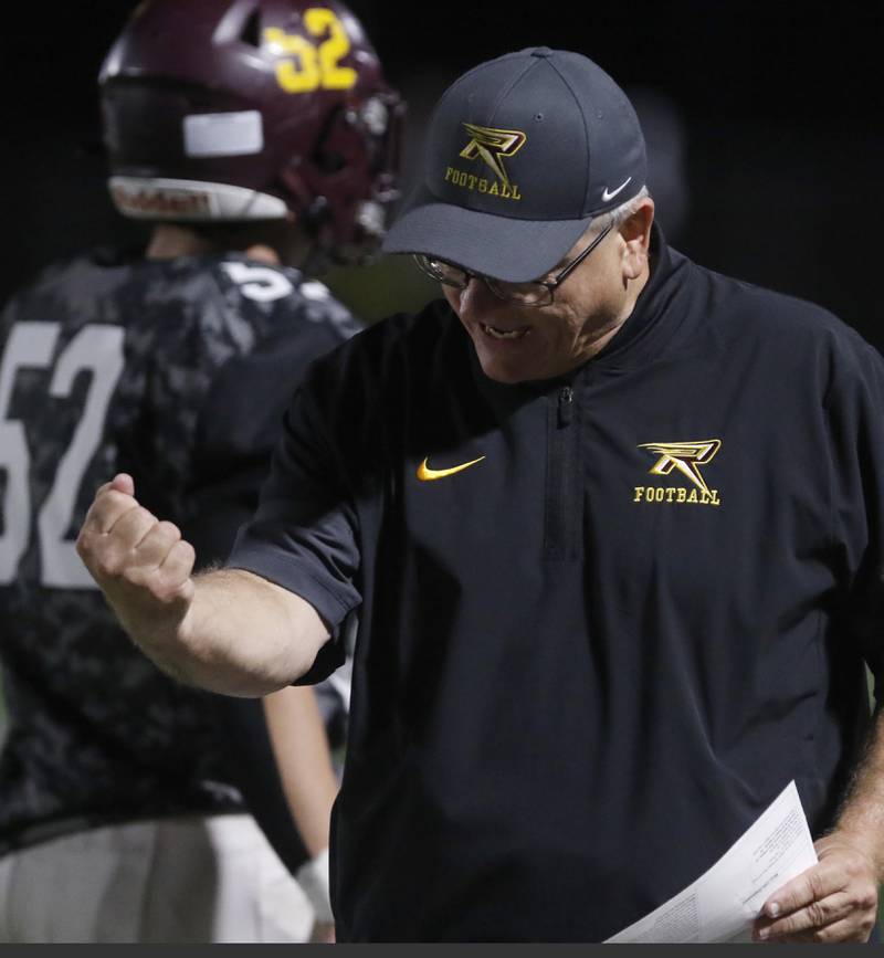 Richmond-Burton Head Coach Mike Noll celebrates a touchdown during a Kishwaukee River Conference football game against Marengo on Friday, Oct. 17, 2025, at Richmond-Burton High School in Richmond.