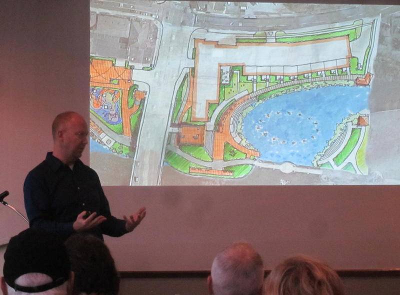 Lance Thies, an urban planner and designer with the Hitchcock Design Group, speaks about a proposal for redeveloping the former Mill Race Inn June 27 at the last of three charrette planning sessions held at the Riverside Receptions & Conference Center.