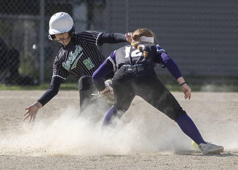 Rock Falls’ Madisyn Eikenberry slides in safe on a steal at second against Dixon Thursday, May 7, 2026.
