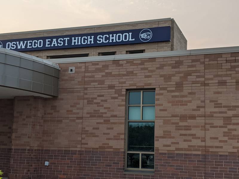 Oswego School District 308 is investigating acts of vandalism that occurred at Oswego East High School Wednesday night, including racial slurs written on the school grounds.