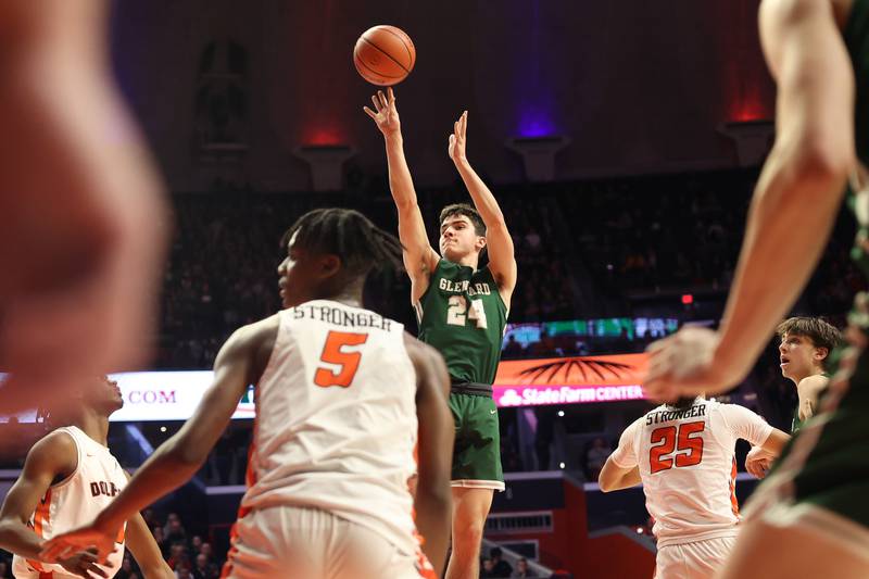 Glenbard West’s Paxton Warder puts up the deep shot against Whitney Young in the Class 4A championship game at State Farm Center in Champaign. Saturday, Mar. 12, 2022, in Champaign.