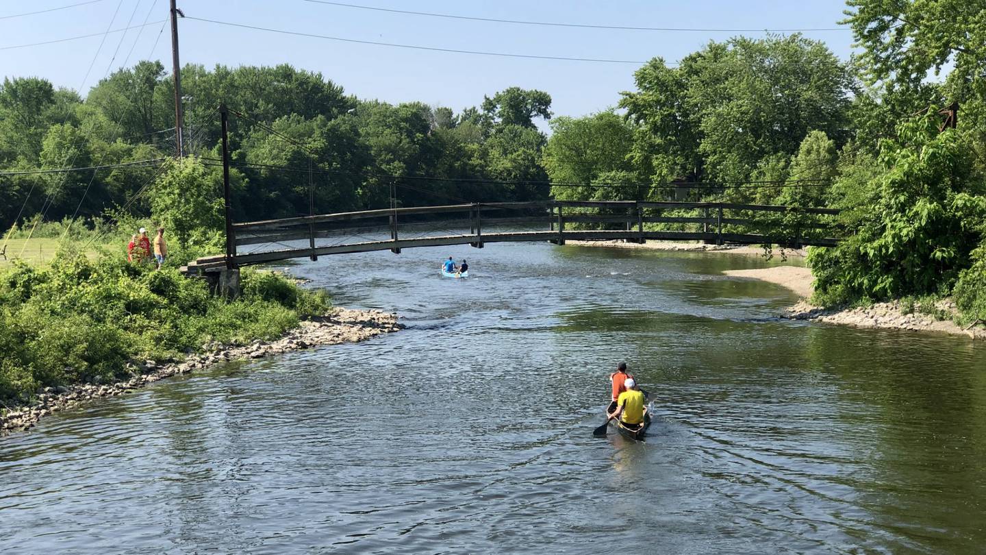 Racers paddle on the Fox River in Batavia Saturday morning June 3, 2023 during the Mid-American Canoe and Kayak Race.
