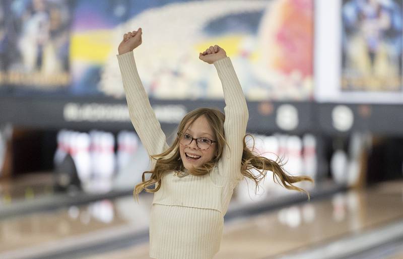 Sterling St. Mary’s School fourth grader Sloane Gabler reacts to a good roll Tuesday, Jan. 28, 2025, at Blackhawk Lanes.