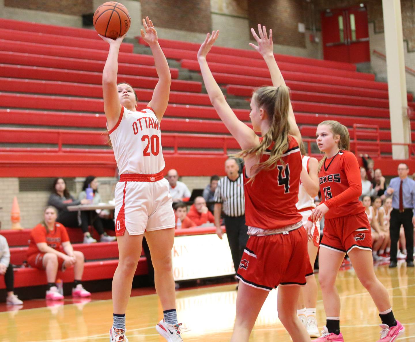 Ottawa's Kendall Lowery shoots a jump shot over Yorkville's Macie Jones on Monday, Dec. 4, 2023 at Kingman Gym.