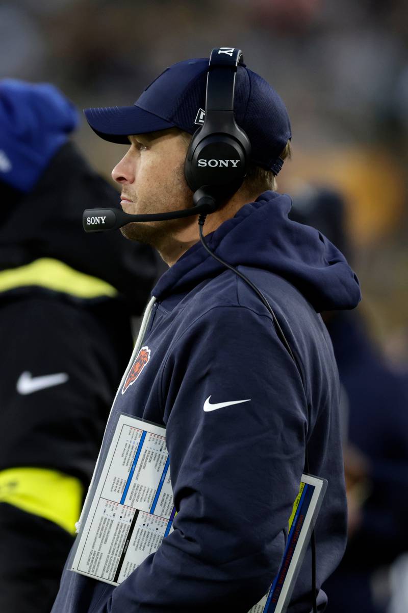 Chicago Bears head coach Ben Johnson looks on during the first half of an NFL football game against the Green Bay Packers, Sunday, Dec. 7, 2025, in Green Bay, Wis. (AP Photo/Matt Ludtke)