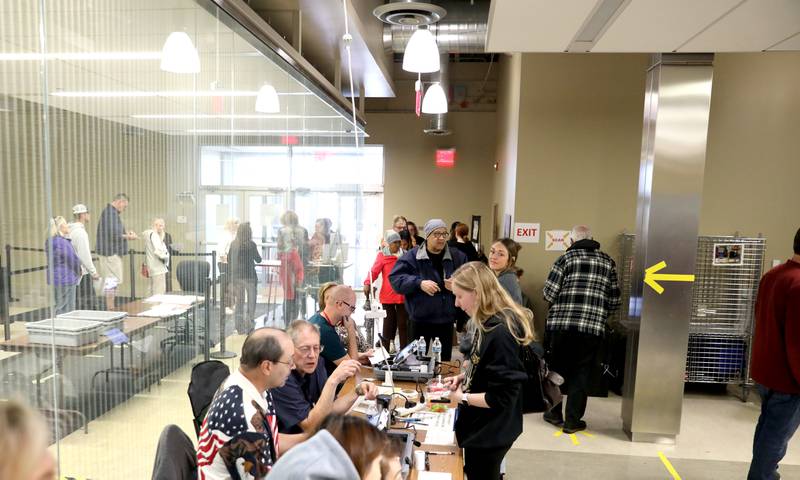 Kane County residents line up to vote inside the Kane County Branch Court for the General Election on Tuesday, Nov. 5, 2024 in St. Charles.