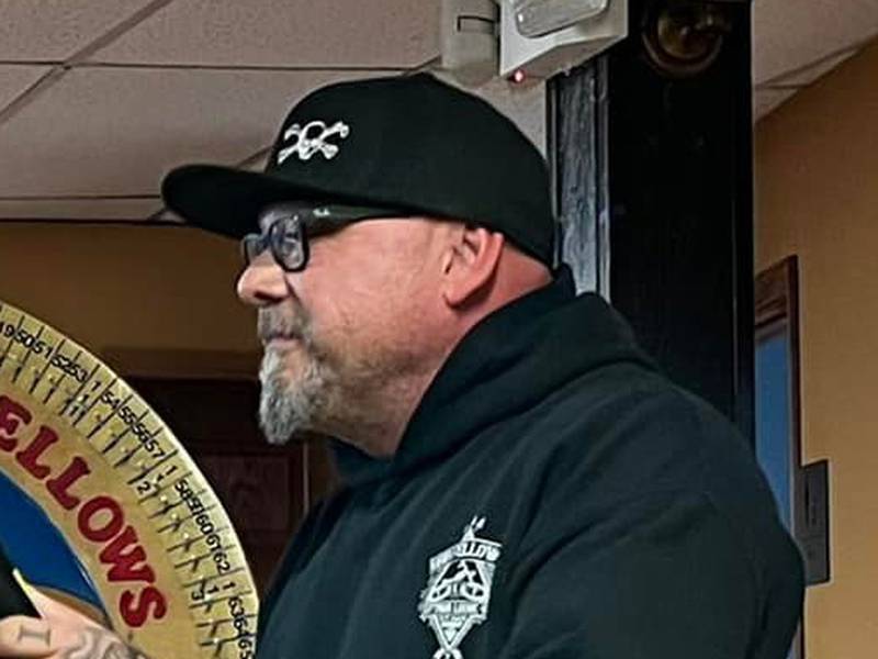 Ray Jackson (right) of the Independent Order of Odd Fellows Ottawa Lodge 41 presents a check to Ket Johnson of the Seneca Community Food Pantry during the Wheel of Meat fundraiser March 12 at 3rd Bar in Seneca.