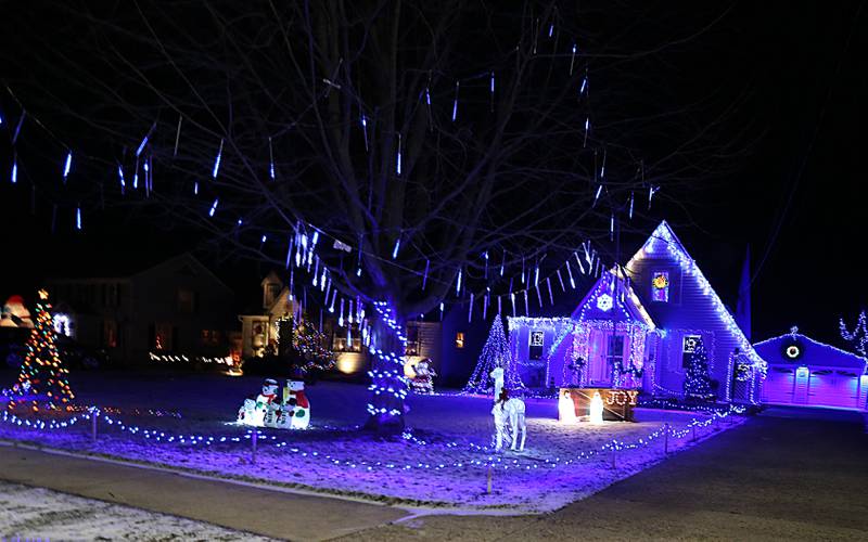This home has everything blue lights that blankets the entire home and yard on Tuesday, Dec. 20, 2022 located at 436 E. Crown Street in Princeton