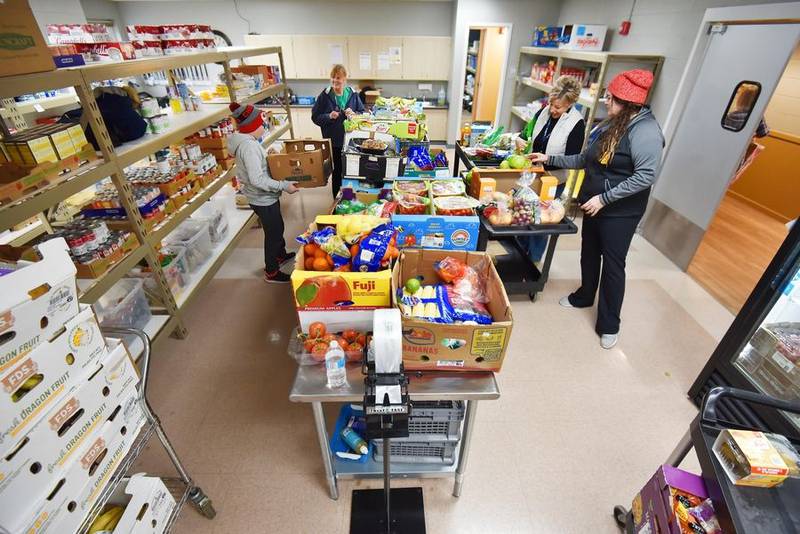 Suburban food pantries like Shepherd's Heart Food Pantry in Geneva say they're seeing a rise in need as the holiday season arrives.
