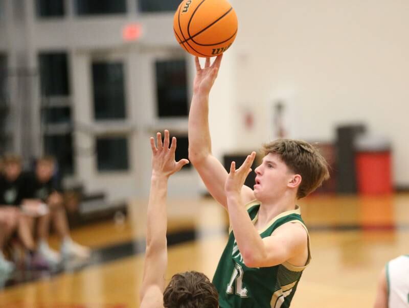 St. Bede's Carson Riva looks to pass the ball against Eureka during the 50th annual Colmone Classic on Monday, Dec. 9, 2024 at Hall High School.
