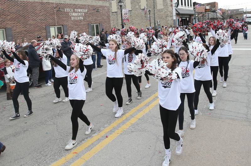 Waltham Grade School cheerleaders march during the 16th annual Utica Veterans Parade and Air Show on Sunday Nov. 5, 2023 downtown Utica.
