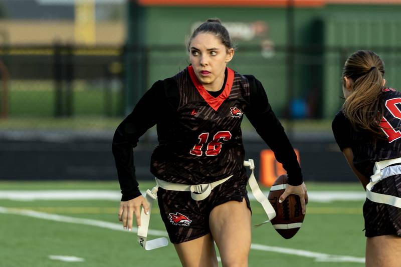 Yorkville's Hayden Hodges runs the ball during the IHSA Danville Sectional varsity flag football game against Plainfield Central at Plainfield East on Oct. 13, 2025.