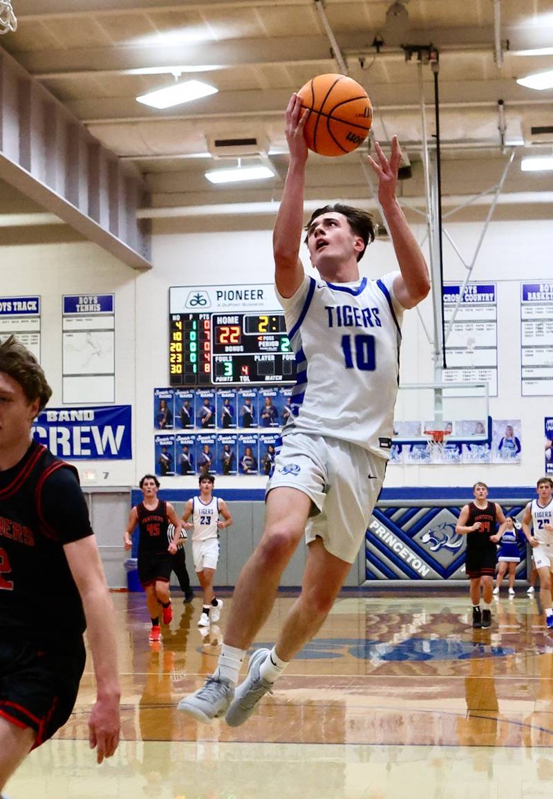 Princeton junior Gavin Lanham takes in a layup against Erie-Prophetstown Friday night at Prouty Gym.