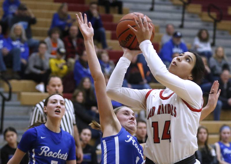 Huntley's Yasmine Morsy shoots the ball in front of Burlington Central's Kenzie Andersen during a Fox Valley Conference girls basketball game Friday, Feb.2, 2024, at Huntley High School.