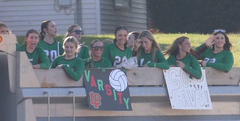 The L-P volleyball team rides a float during the L-P Homecoming parade on Thursday, Sept. 26, 2024 near the corner of 7th Street and Orleans Street in Peru.