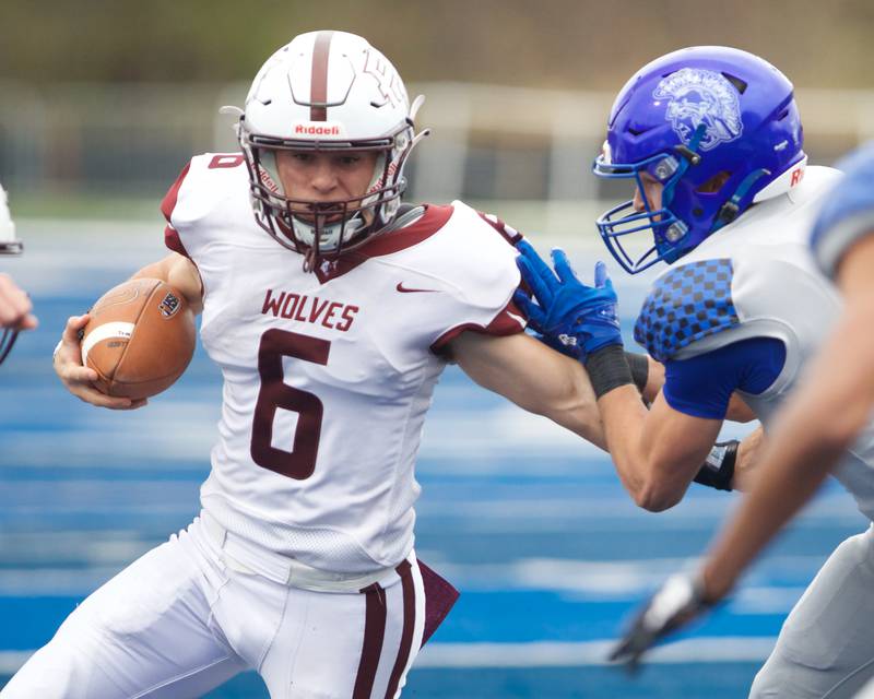 Prarie Ridges Luke Vanderwiel runs the ball for a gain against St. Francis at the Class 5A second-round playoff game on Saturday Nov.9,2024 in Wheaton.