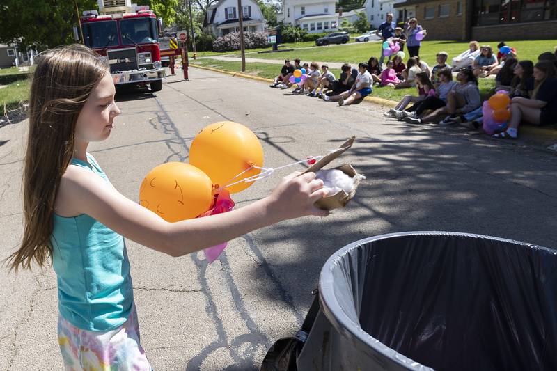 Successful egg drops go on to compete at higher heights whereas unsuccessful one go in the trash. Lincoln fifth grader Aria Hoffman drops her team’s here Friday, May 16, 2025,