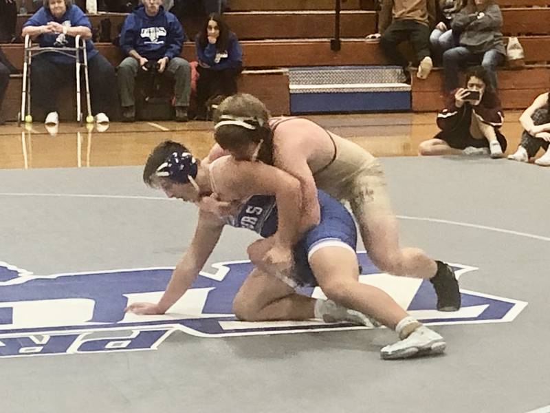 Morris' A.J. Franzetti works on top against Princeton's Anthony Vujanov Tuesday night at Prouty Gym.