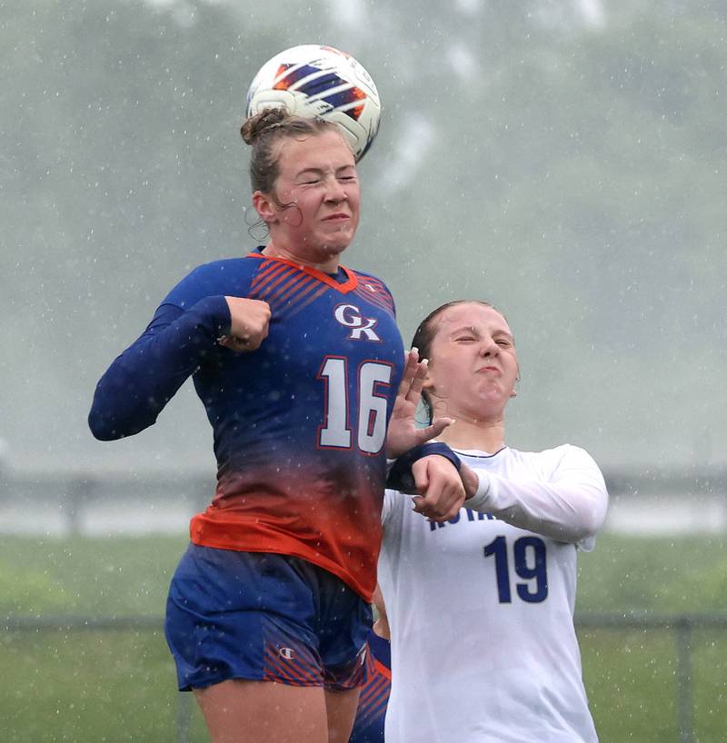 Genoa-Kingston's Ally Poegel heads the ball over Rockford Christian's Eliana Wisniewski Tuesday, May 20, 2025, during their Class 2A regional final game at Rockford Christian High School.