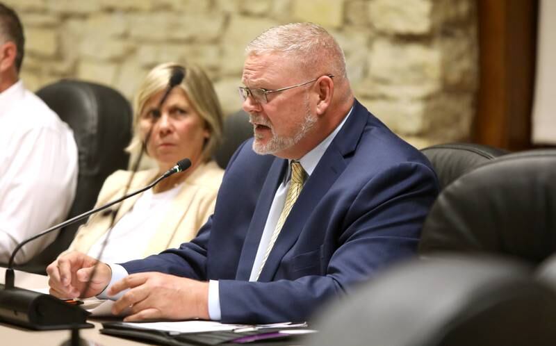 Rob Russell (right), incumbent candidate for Kane County Coroner, gives a three-minute statement during a candidate forum for the 2024 General Election hosted by the League of Women Voters of Central Kane County on Monday, Sept. 30, 2024 at Batavia City Hall.