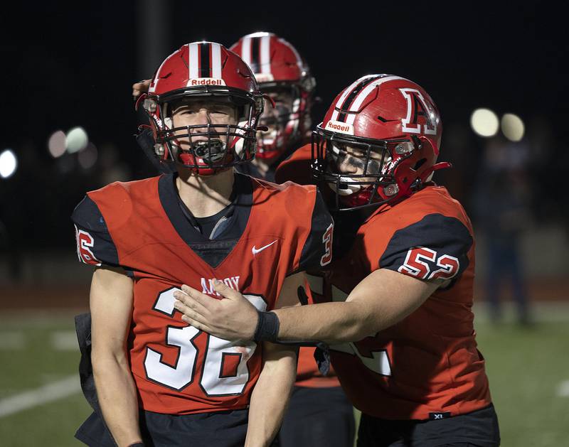 Amboy’s Caleb Yanos celebrates a late game tackle against Milledgeville Friday, Nov. 22, 2024, during the 8-man football championship in Monmouth.