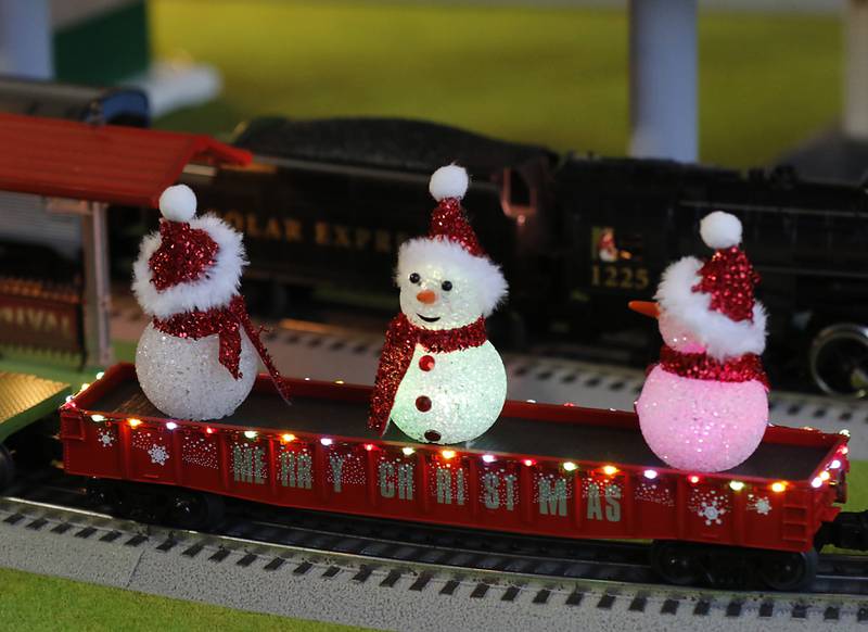 A section of John Smith’s holiday-themed trains on Thursday, Dec. 19, 2024, at his home in McHenry. He has been opening up his garage along the riverwalk during the weekends for people to see the trains.