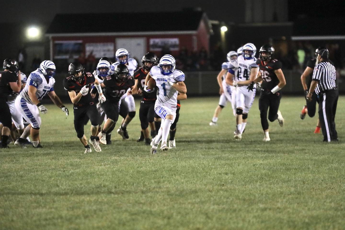 Princeton sophomore back Casey Etheridge breaks loose for a touchdown run at Orion Friday night. He scored five touchdowns in the Tigers' 42-0 win.