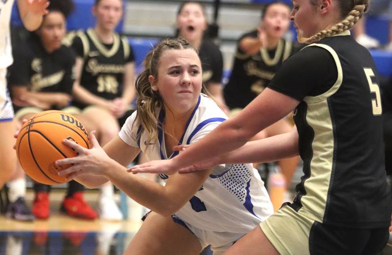 Burlington Central’s Kelsey Covey looks for an option against Sycamore in girls basketball at Burlington Central High School in Burlington on Tuesday, November 18, 2025.