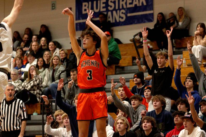 McHenry’s Marko Stojich takes a jumper against Kaneland in Hoops for Healing basketball tournament championship game action at Woodstock Wednesday.