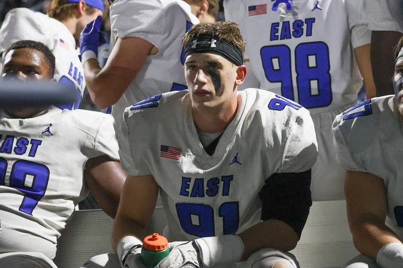 Lincoln-Way East’s Caden O’Rourke watches film between series against Minooka on Friday, Nov. 8, 2024 in Minooka.