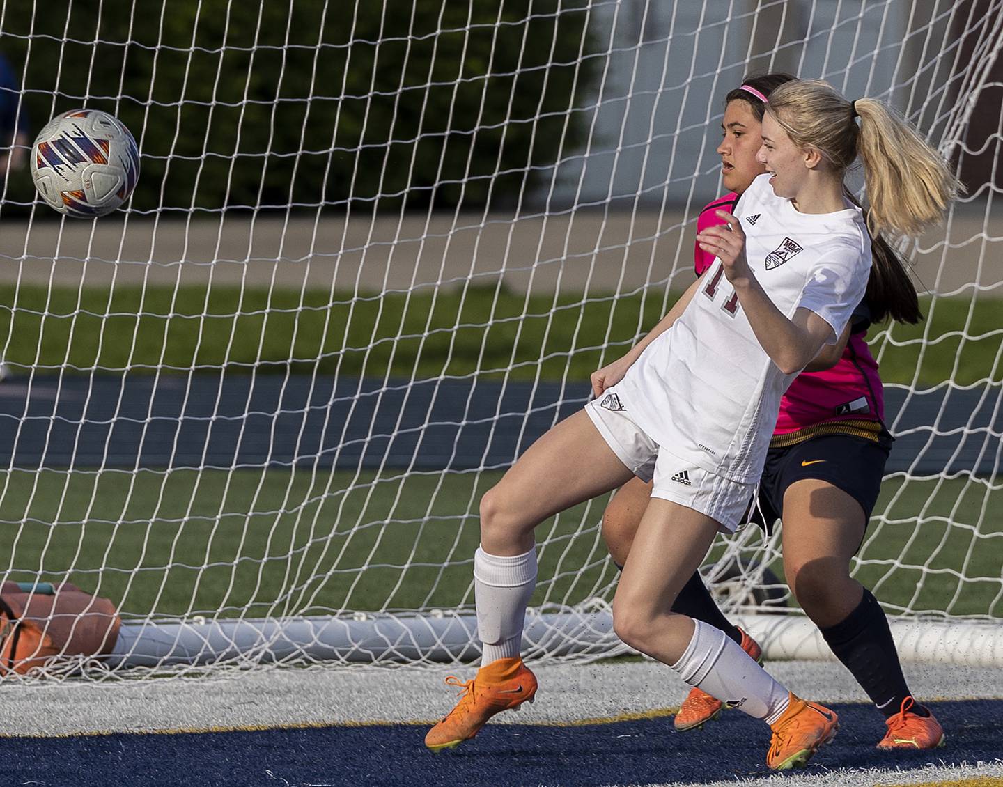 Moline’s Hannah McNall puts it into the back of the net against Sterling goalkeeper Gabby Melendez Tuesday, April 30, 2024 at Sterling High School.