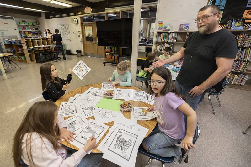 Granny Rose employee Brian Dixon talks to students Thursday, Feb. 5, 2026, about animal care at Granny Rose.